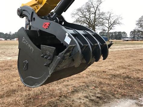 operating hydraulic thumb on mini excavator|excavator bucket with thumb attached.